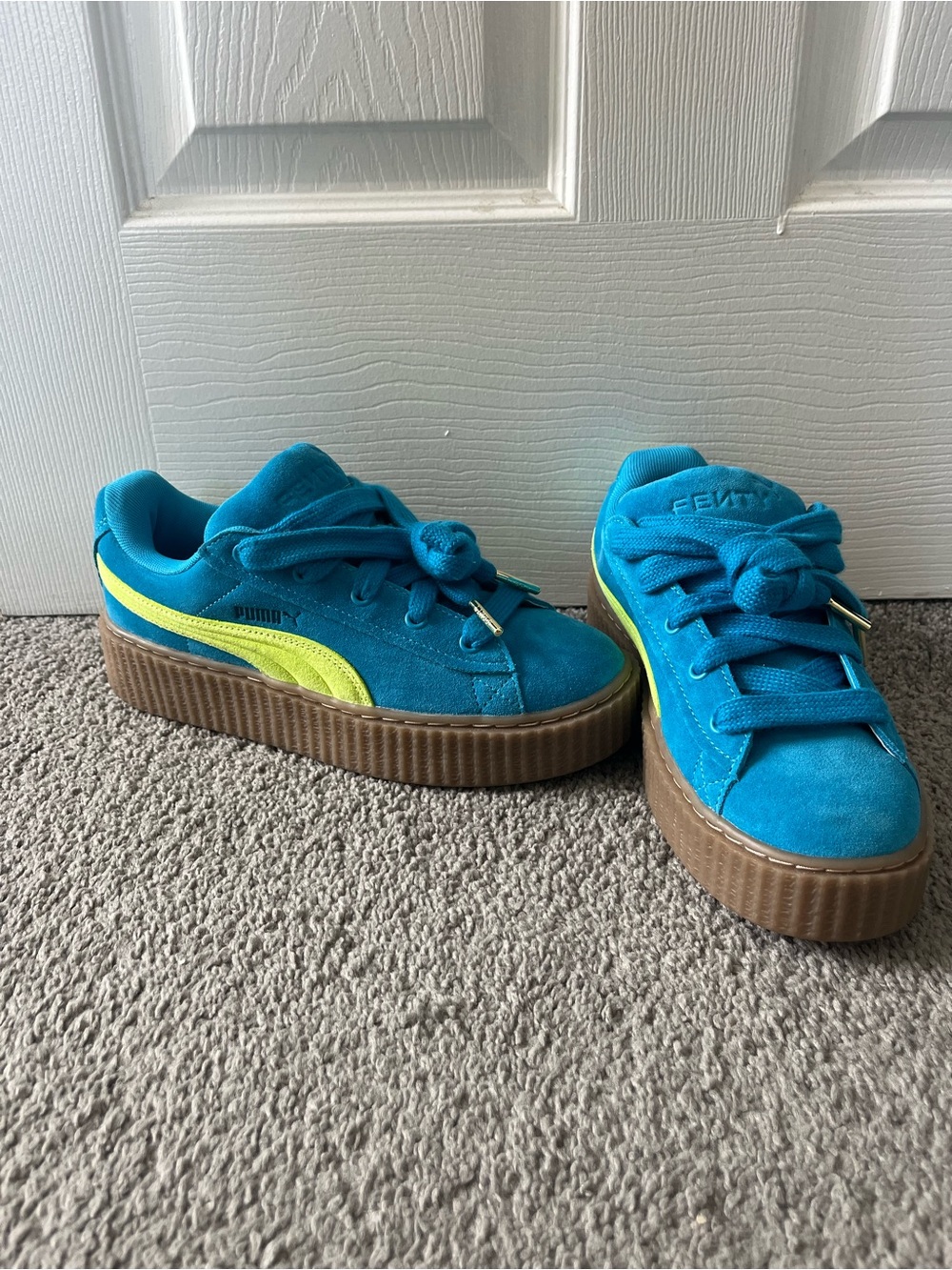 NWOT Puma Fenty Sneakers.